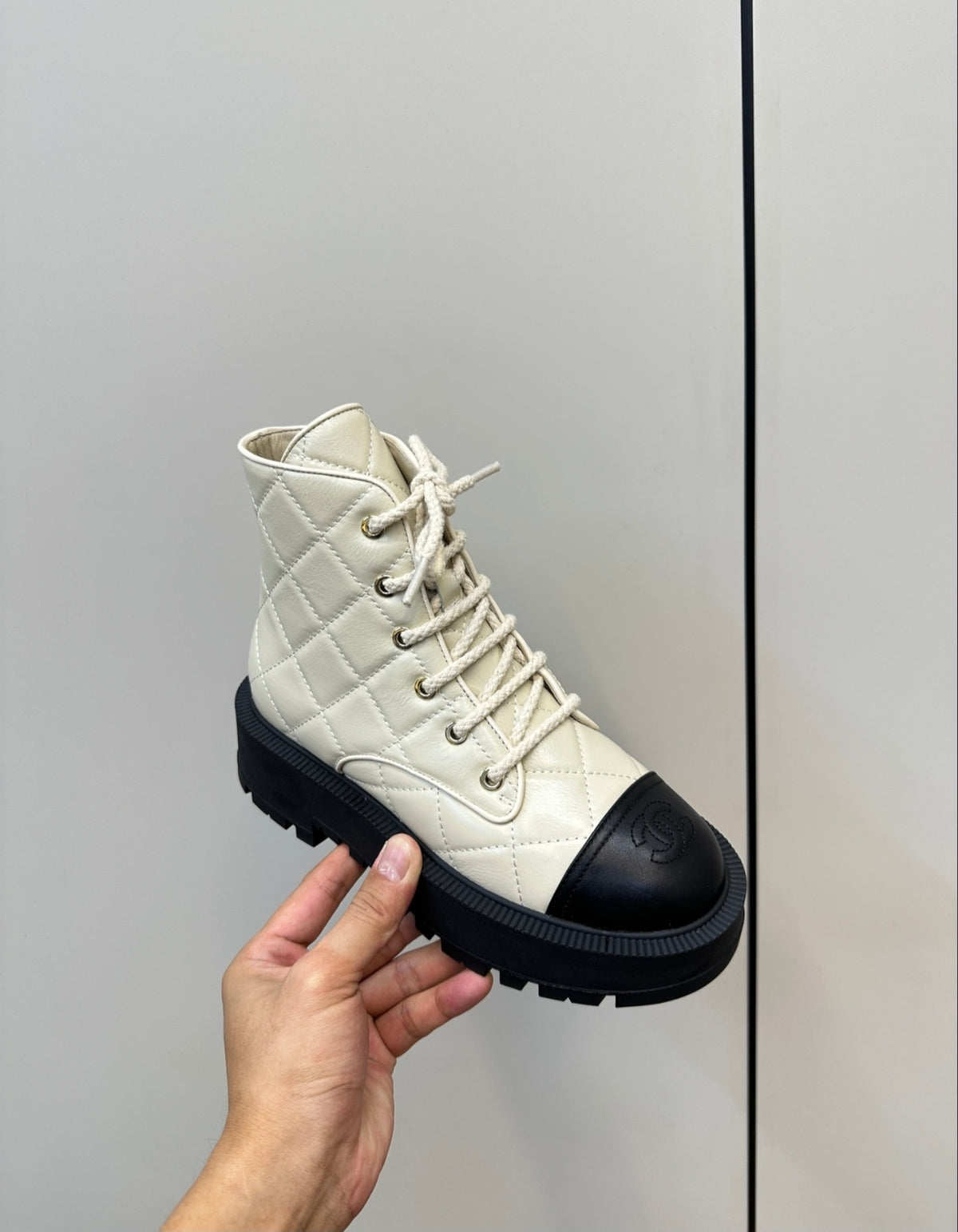 CHANEL QUILTED LACE-UP COMBAT BOOTS – IVORY / BLACK