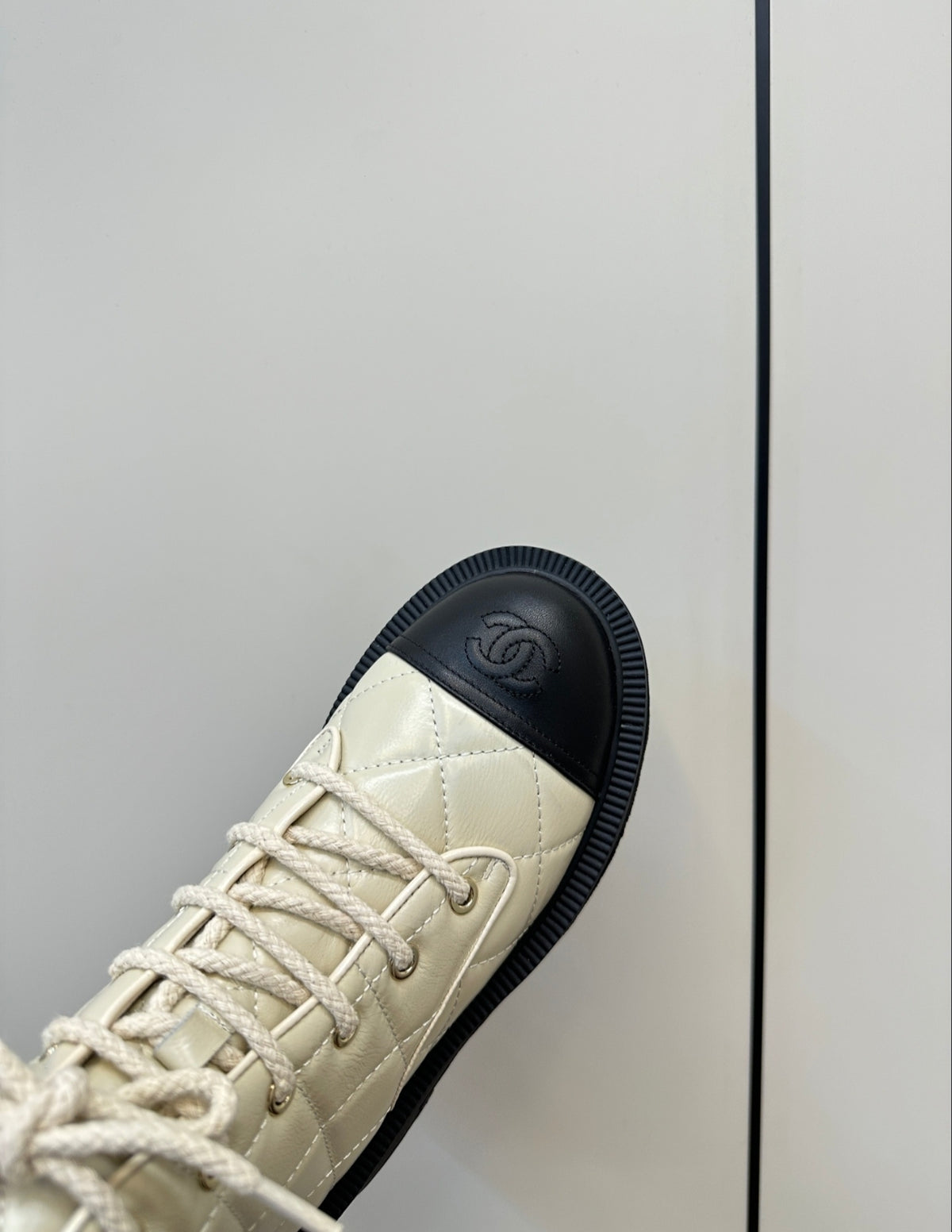 CHANEL QUILTED LACE-UP COMBAT BOOTS – IVORY / BLACK
