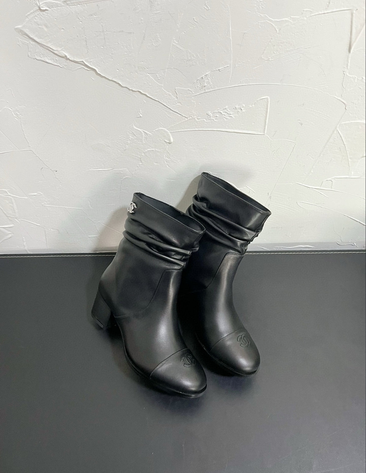 CHANEL CC SLOUCH ANKLE BOOTS – BLACK
