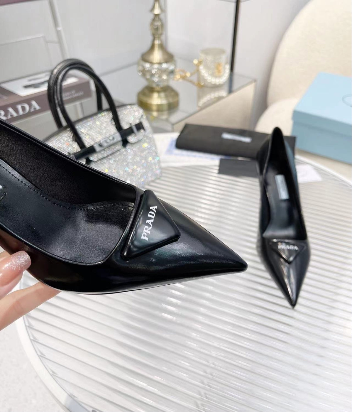 Prada Triangle Logo Pointed-Toe Pumps