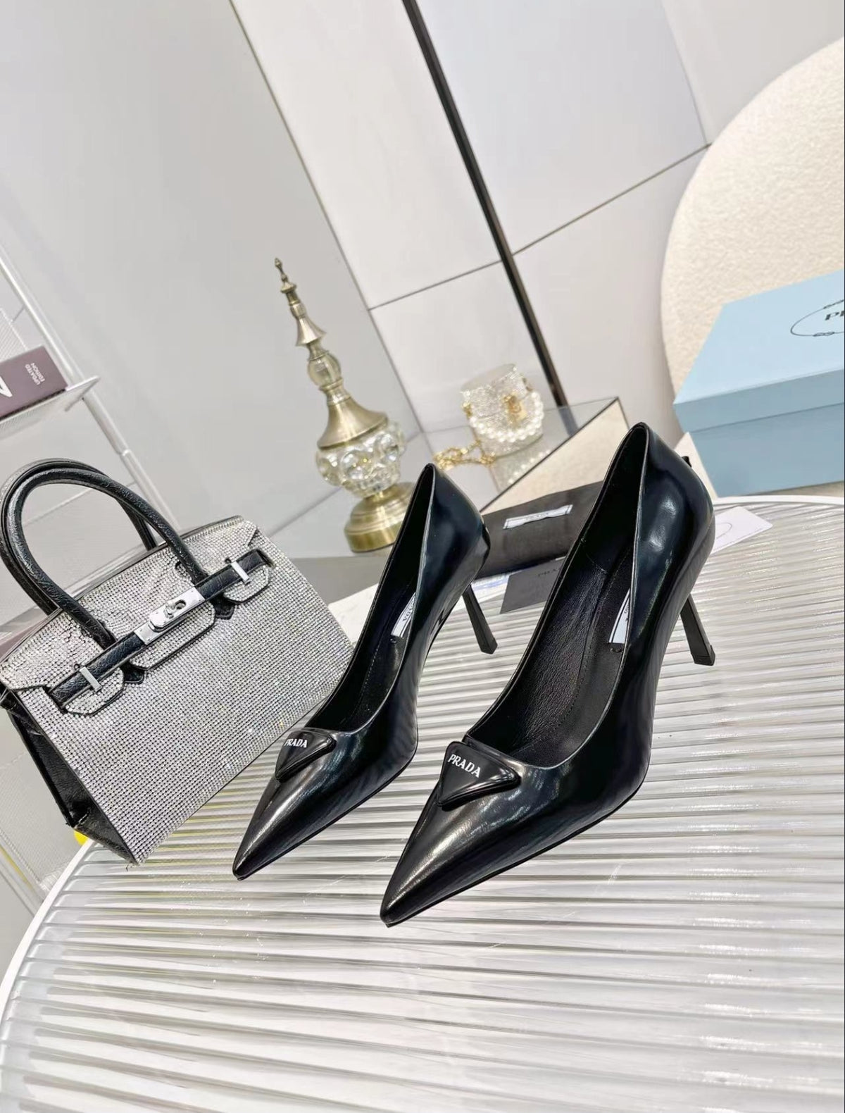 Prada Triangle Logo Pointed-Toe Pumps