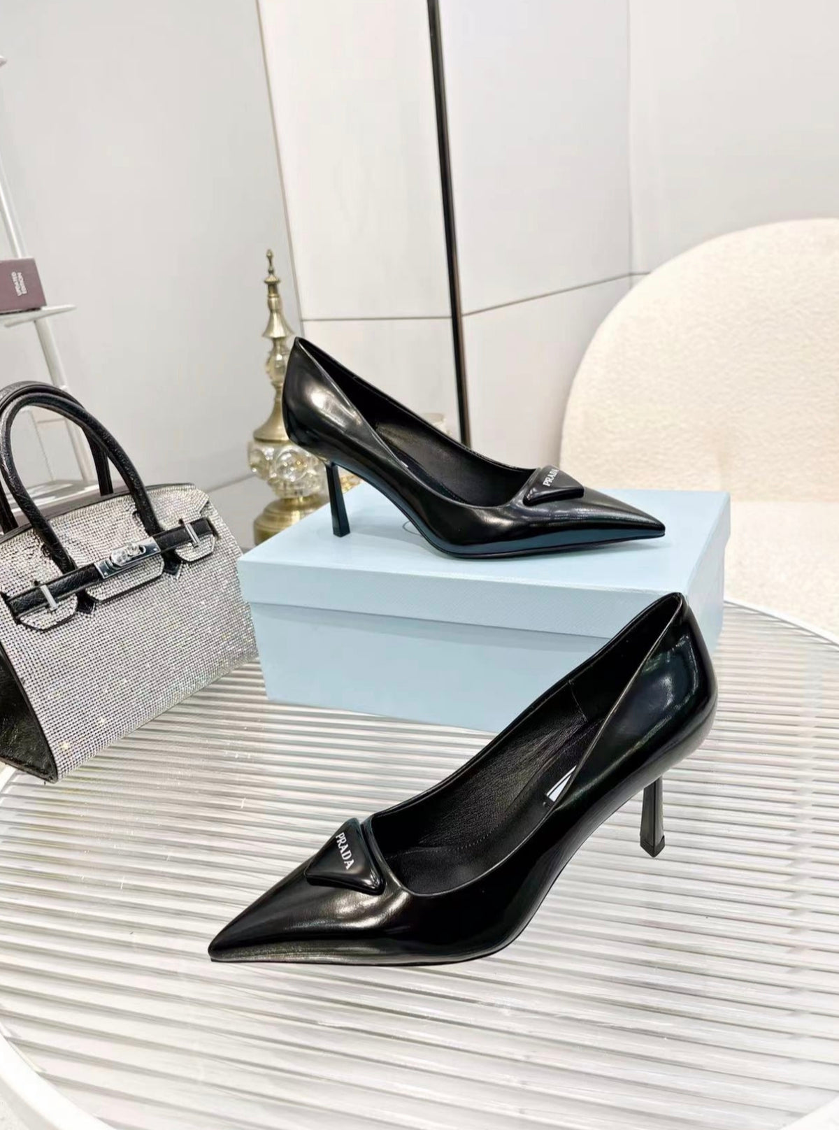 Prada Triangle Logo Pointed-Toe Pumps