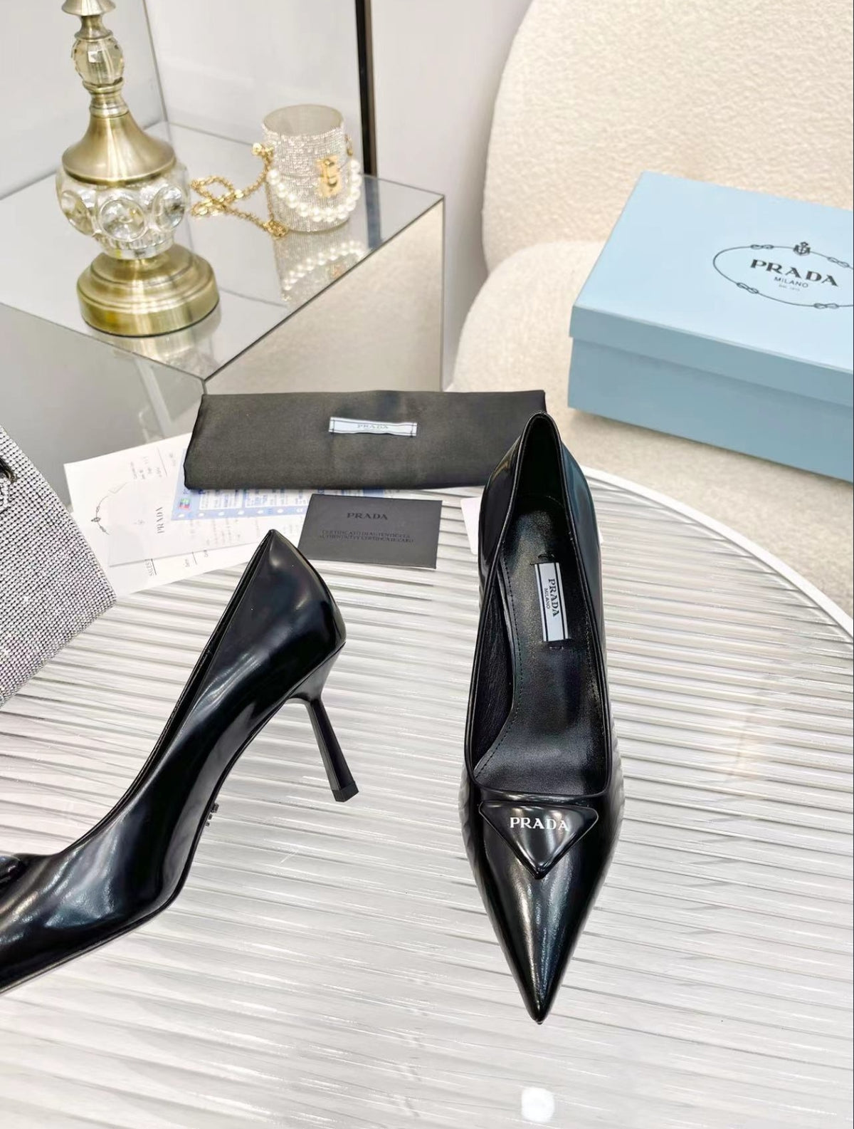 Prada Triangle Logo Pointed-Toe Pumps