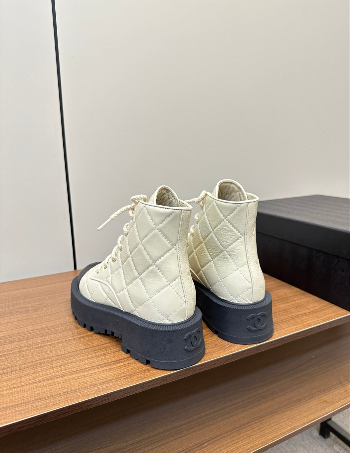 CHANEL QUILTED LACE-UP COMBAT BOOTS – IVORY / BLACK