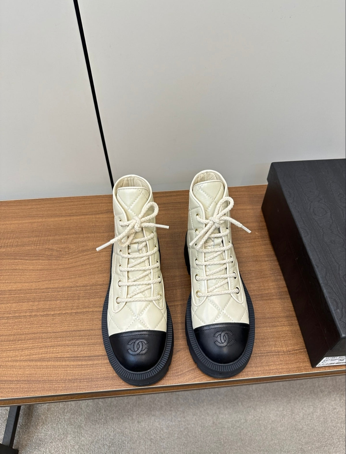 CHANEL QUILTED LACE-UP COMBAT BOOTS – IVORY / BLACK