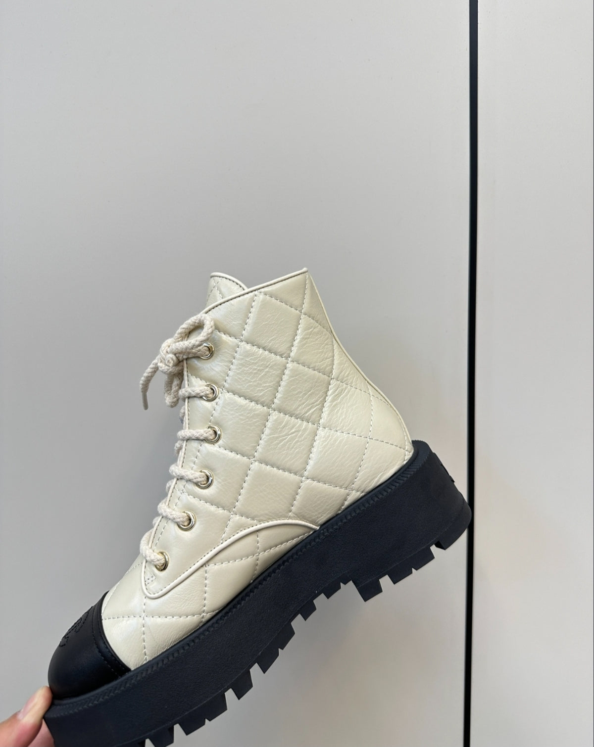 CHANEL QUILTED LACE-UP COMBAT BOOTS – IVORY / BLACK